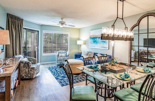 Arcadian Shores Condo | $150 activities - E-gift card when you book - Lakefront Screened in Porch | KLC 112