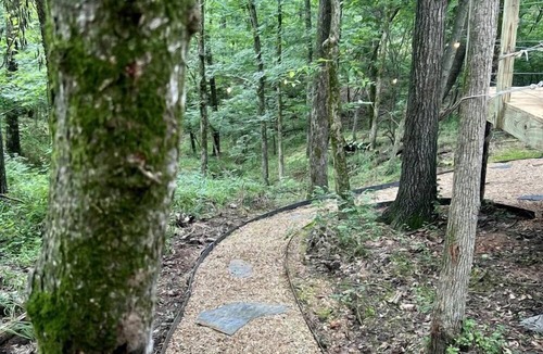 Gentry RV Rental | Charming Woodland Glamping Tents with Fire Pit and Elevated Decks near Gentry, West Virginia