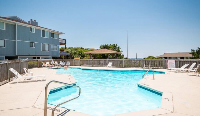 Sea-Nic View: Beachwalk condo in Caswell Beach with a community seasonal pool an